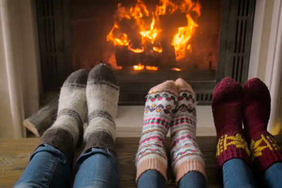 Feet warming by fire